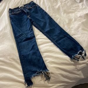 Zara high-waist, dark jeans with rough, raw edges